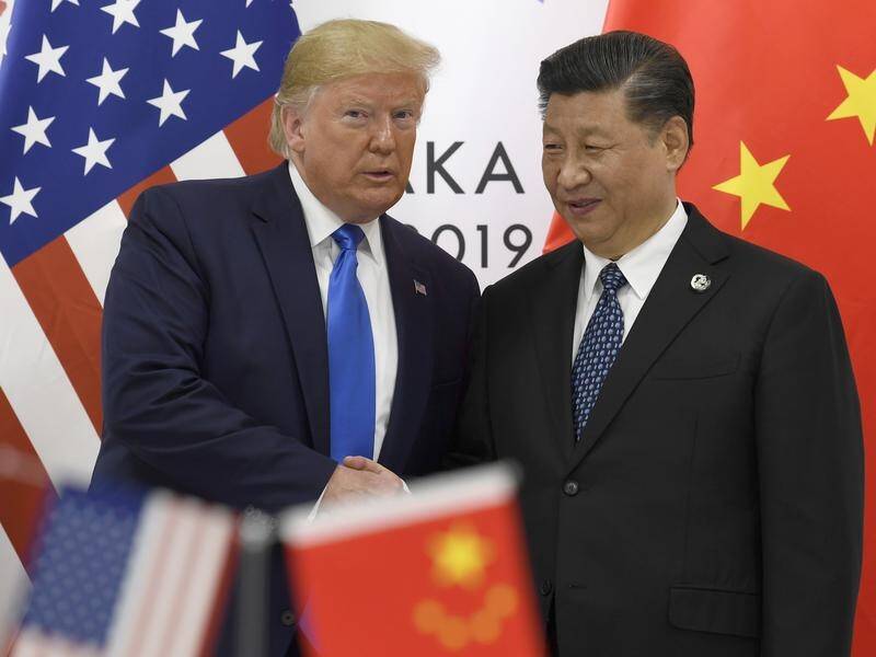 US President Donald Trump has scrapped plans for tariffs on Chinese products in a deal with Beijing.