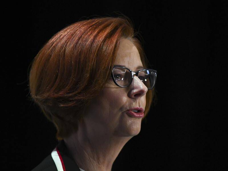 Former PM Julia Gillard says community and government suicide prevention initiatives are working.