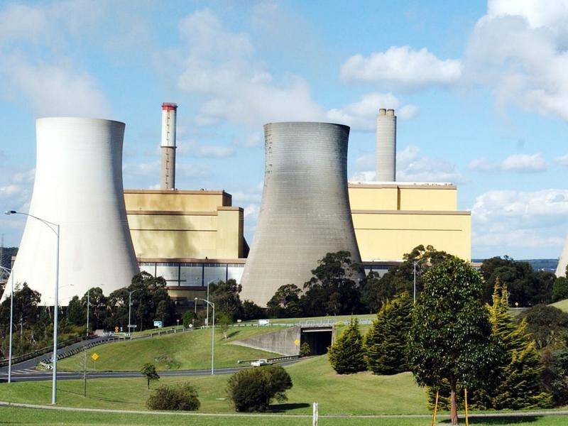 Victoria's Yallourn power station has cut output to conserve coal, amid a mine flood threat.
