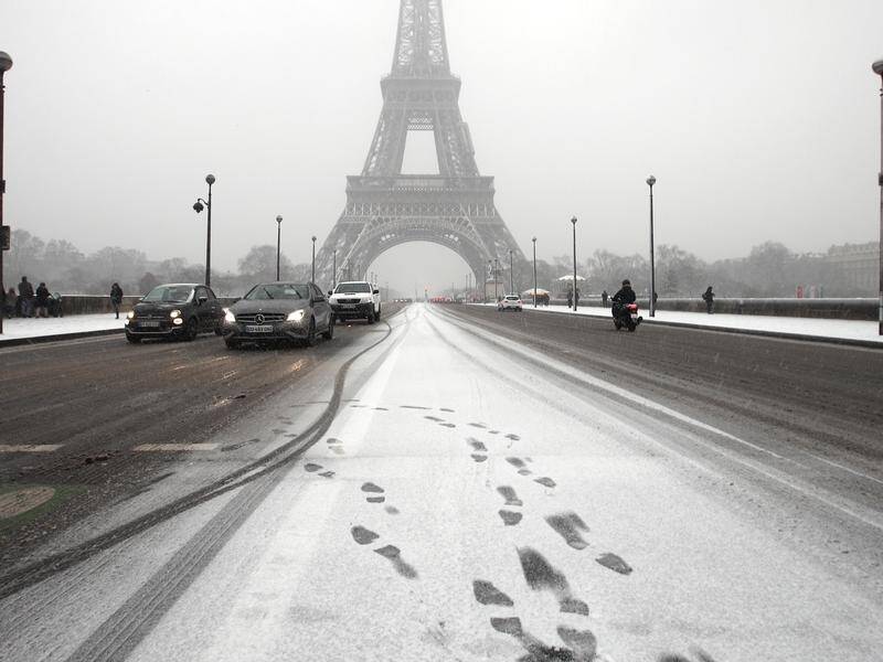 Bad weather conditions have hit France forcing the Eiffel Tower to close during snowfall in Paris.
