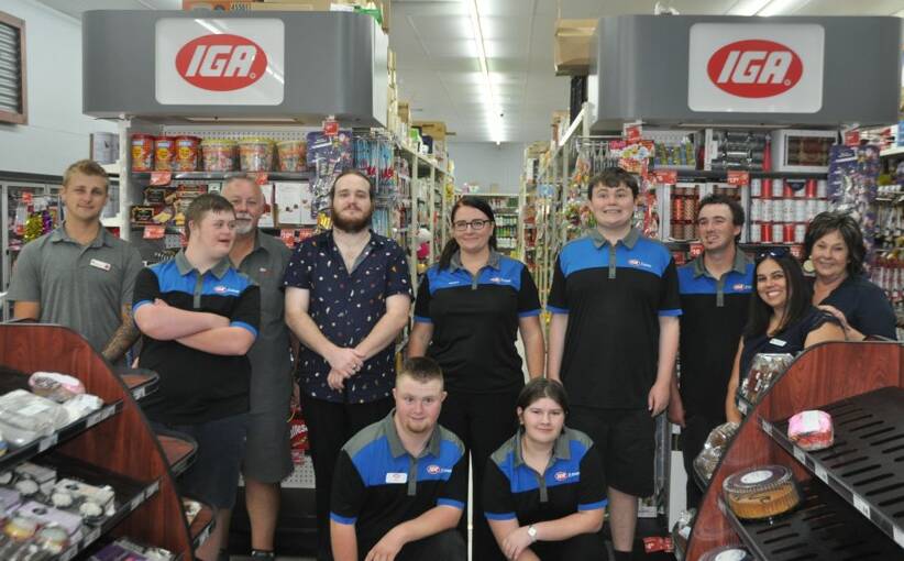 Support Worker Brayden Fisher, Clayton Davis, Support Worker David Middlemiss, IGA employee Dominic Trees, IGA Manager Amanda Sing, Josh Parkinson, IGA employee Toby Robinson, 2IC Adelle Riddel, Key Employment manager Lisa Reed. Front Row: IGA employee's Jake Kelly and Monique Mcilwain. Photo: Stephen Katte 
