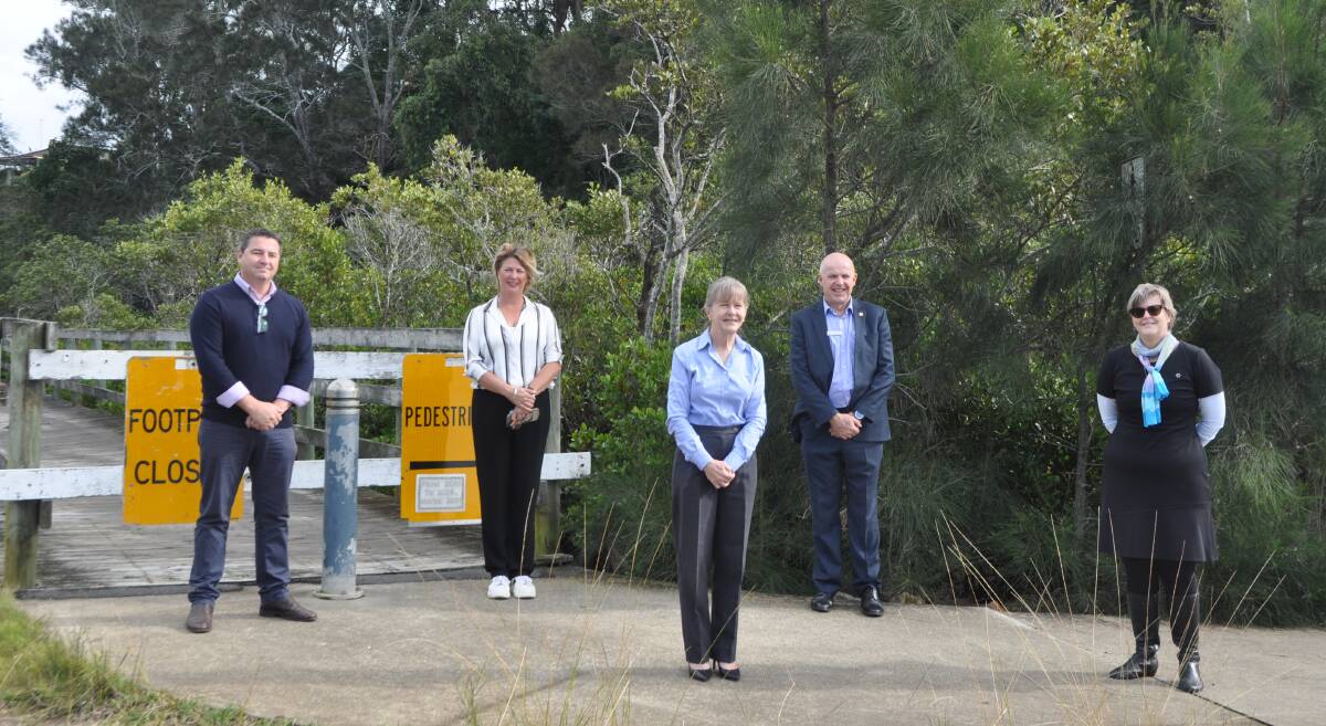 Pat Conaghan, Melinda Pavey, Rhonda Hoban, Michael Coulter and Teresa Boorer in front of the closed boardwalk between the Visitor Information Centre and Bellwood Park. Photo: Stephen Katte 