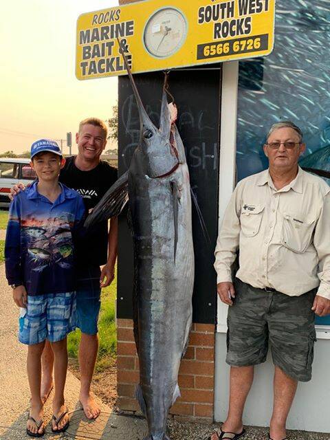 Graeme Allen, his son Jayden Allen and father-in-law Allan Purcell worked as a team to land the monster fish. Photo: Supplied 
