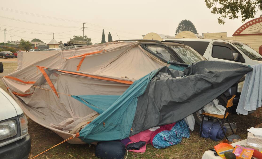 HOME FOR NOW: Amanda and Ric have been living in a tent for nearly a week. Photo: Stephen Katte 