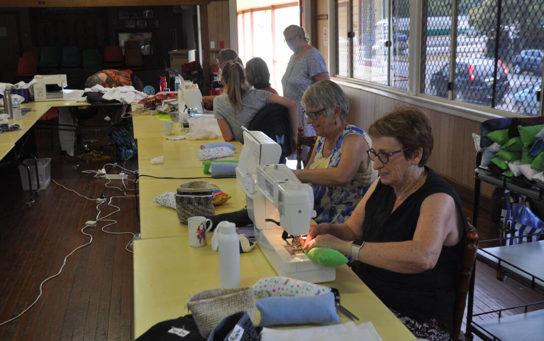 The ladies have been busy making bat wraps, joey pouches and kangaroo hanging pouches. Photo: Stephen Katte 