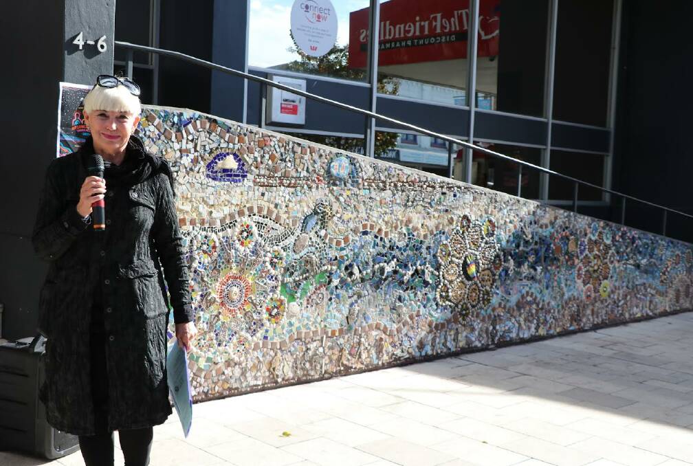 Kempsey Shire Mayor, Liz Campbell out the front of the Corroboree Magic mosaic. Photo: Supplied 