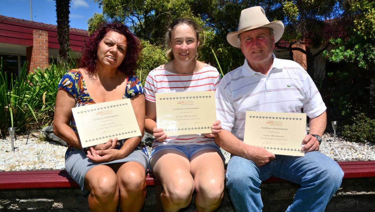 Vicki Taylor, Linda Wilshusen and Colin ‘Coggy’ Wilshusen show off their graduation certificates from the Ngabu Bingayi language class
