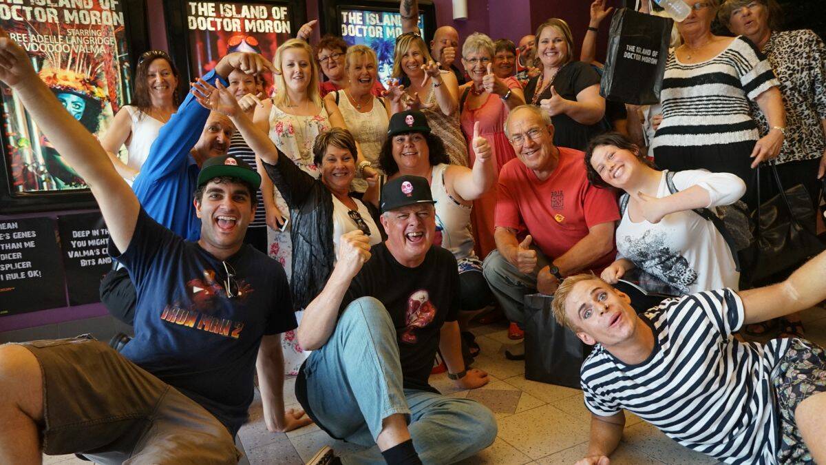 Loved it: a second group of Kempsey Theatre lovers travelled to
Sydney on Sunday to see local director Chris Dockrill’s show ‘The
Island of Dr Moron'. Mr Dockrill is in the centre front with cap. Lisa
Reed is behind Mr Dockrill to the left, with her arm outstretched.
Picture courtesy of Eve Jeffery - Tree Faerie Fotos