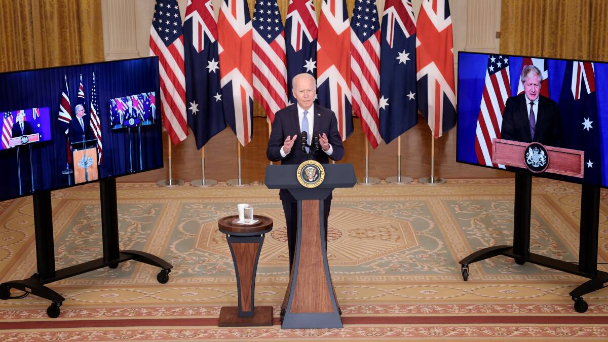 US President Joe Biden announces the formation of the AUKUS partnership, flanked by Australian Prime Minister Scott Morrison (left) and UK Prime Minister Boris Johnson. Picture: Getty Images