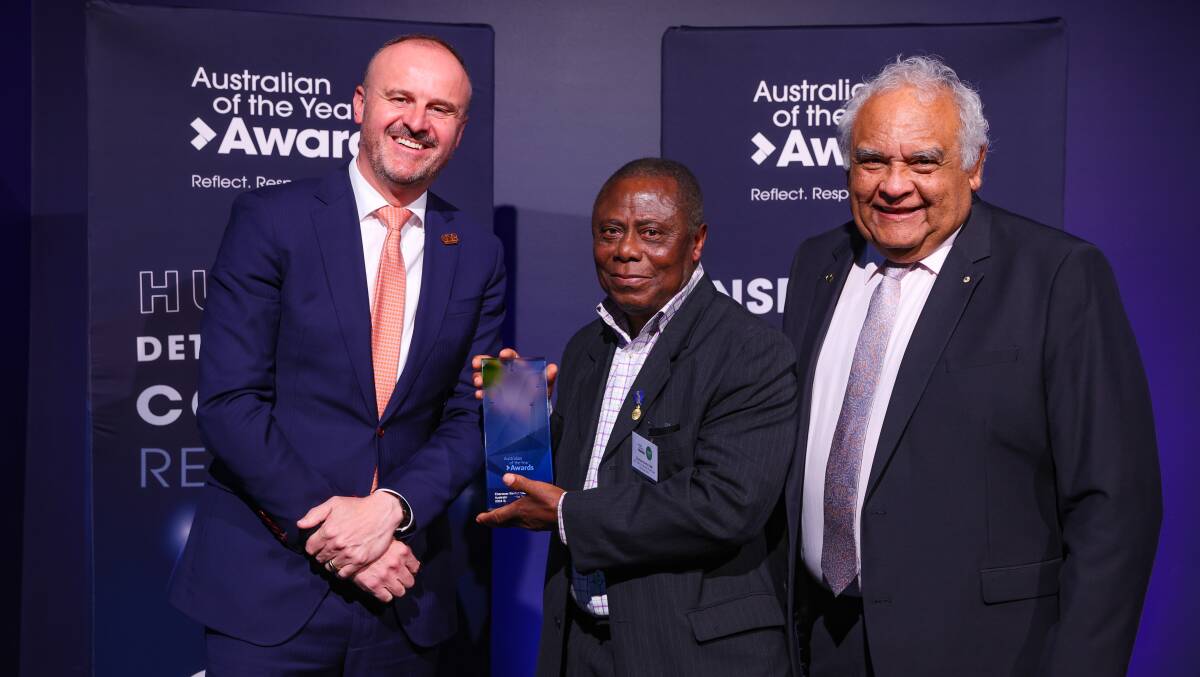 ACT Australian of the Year for 2024 Ebenezer Banful, centre, with ACT Chief Minister Andrew Barr, left, and 2023 ACT Australian of the Year Professor Tom Calma. Picture by Salty Dingo/australianoftheyear.org.au