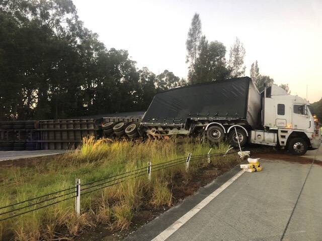 A B-double truck crashed on the Pacific Highway at Coolongolook this morning. Photo: Live Traffic NSW.