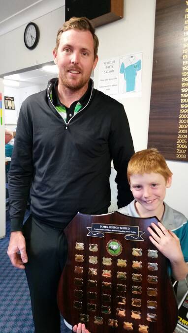 Little champion: Patrick Parker (right) with James Benson. Photo: Supplied.