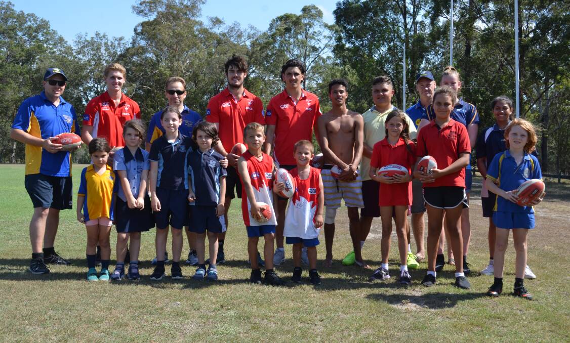 Star studded: Sydney Swans players George Hewett and Justin McInerney hosted a training session with the Macleay Valley Eagles players. Photo: Callum McGregor.