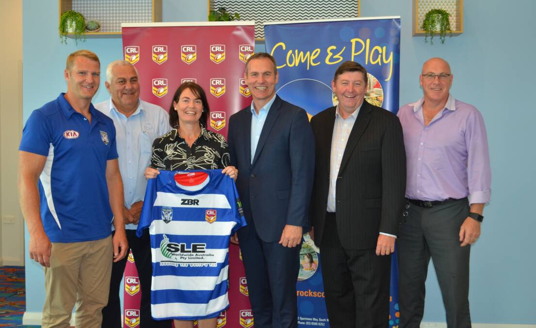 Hat Head product and Bulldogs prop Aiden Tolman (left) Bulldogs CEO Andrew Hill (centre) alongside CRL, Kempsey Shire Council and South West Rocks Country Club representatives. Photo: Callum McGregor.