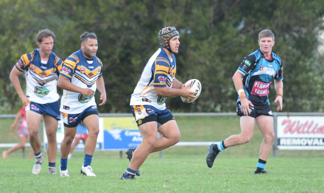 Charge: Mustangs back rower Jesse Douglas carries the ball forward in their second round meeting with the Port Macquarie Sharks. Photo: Penny Tamblyn.