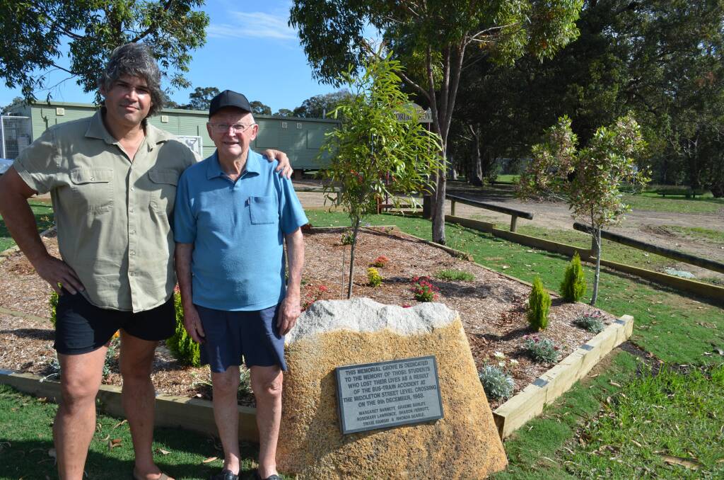 Carl Flaitas and John Bowell have worked tireless to complete the memorial garden ahead of the 50th anniversary on December 9.
