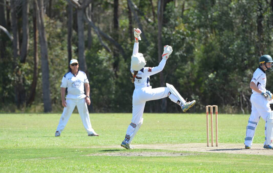 Nulla wicketkeeper Rilee O'Loughlin leaps to catch the ball. 
