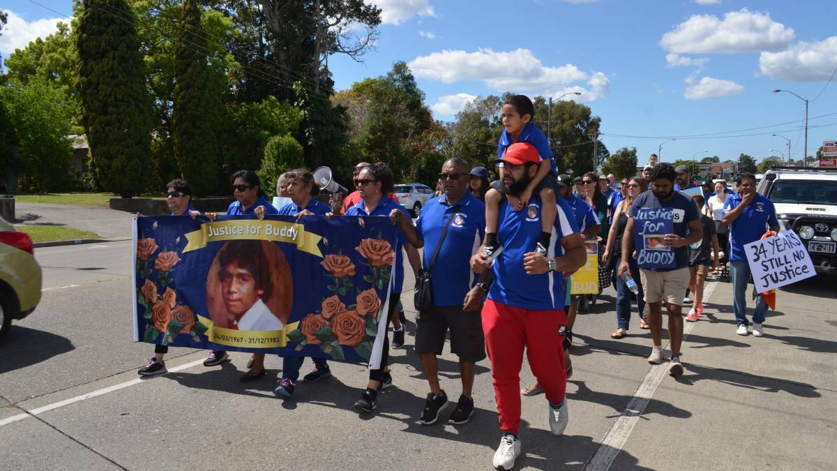 Family and friends of Lewis 'Buddy' Kelly march through Kempsey in September last year