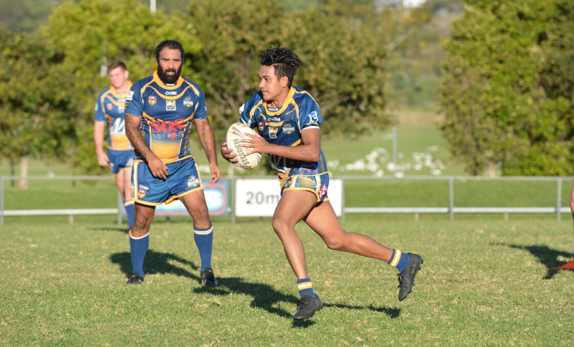 Speed: A Macleay Valley Mustangs first grade player carries the ball forward for his side in a match earlier this season. Photo: Penny Tamblyn.