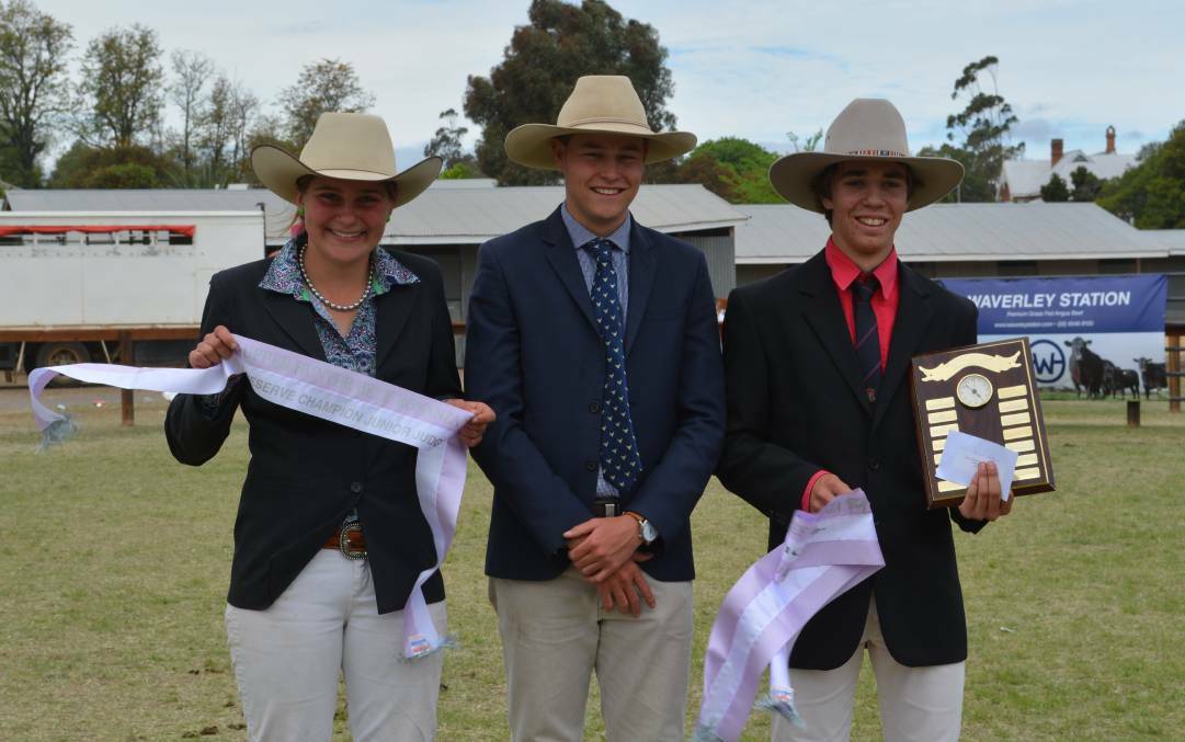 Reserve champion junior judge Emma Steele from NEGS, Armidale, over judge Jack Laurie, Knowla Livestock, Moppy, and champion junior judge Liam Whalen from Kempsey High School.