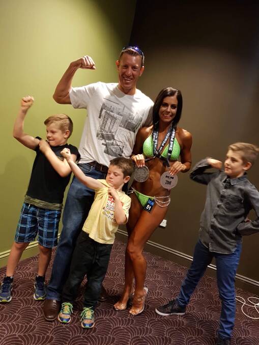 Muscles: Brigitte and Michael Kemp with their three boys. Photo: Supplied.