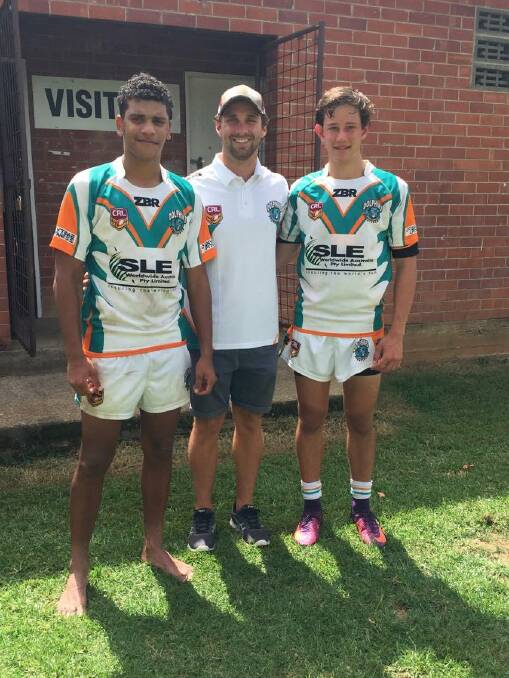 Malachi Roberts and Kaine Parkinson with their U16s East Coast Dolphins coach who is a former Kempsey resident Joel McCafferty.