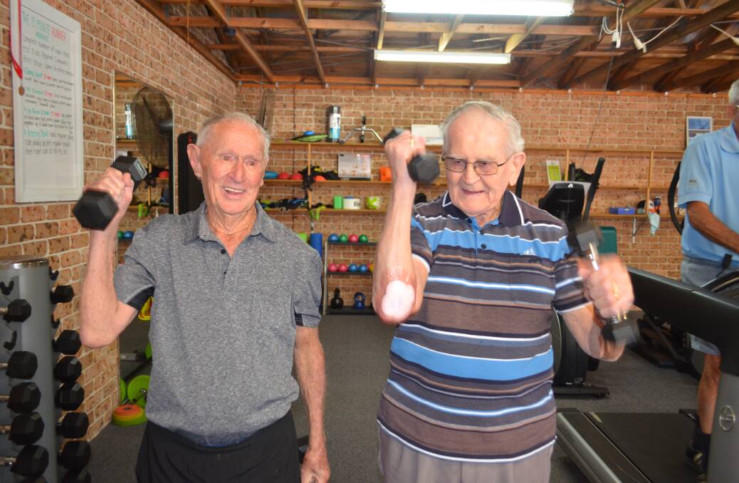 Lift big, get big: Jack Kerry and Bob Fryer exercising their biceps at the GYM AT SWR. Photo: Callum McGregor.