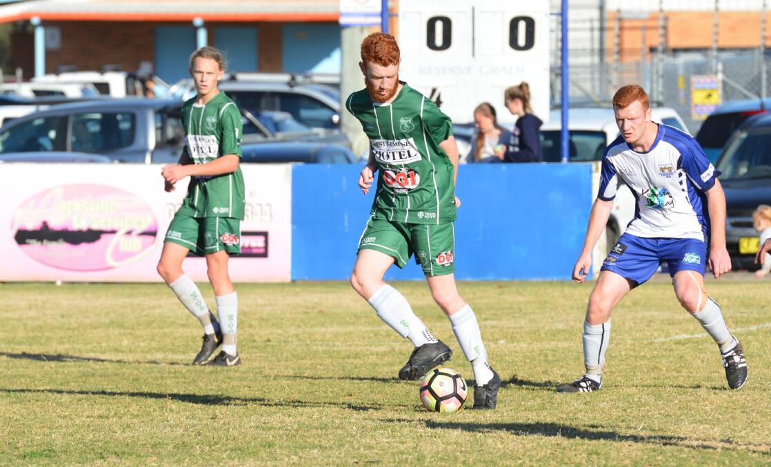 First touch: David Henry controls the ball at his feet during the match against rivals Macleay Valley Rangers. Photo: Penny Tamblyn.
