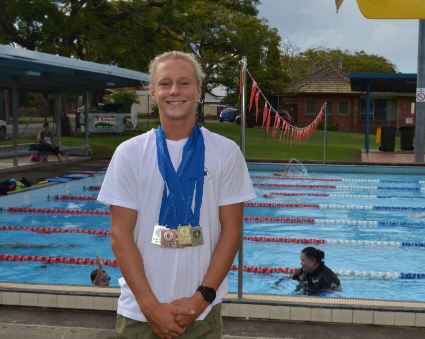 Stoked: Finn Askew returned from the NSW Surf Life Saving Championships with a haul of six medals. Photo: Callum McGregor.