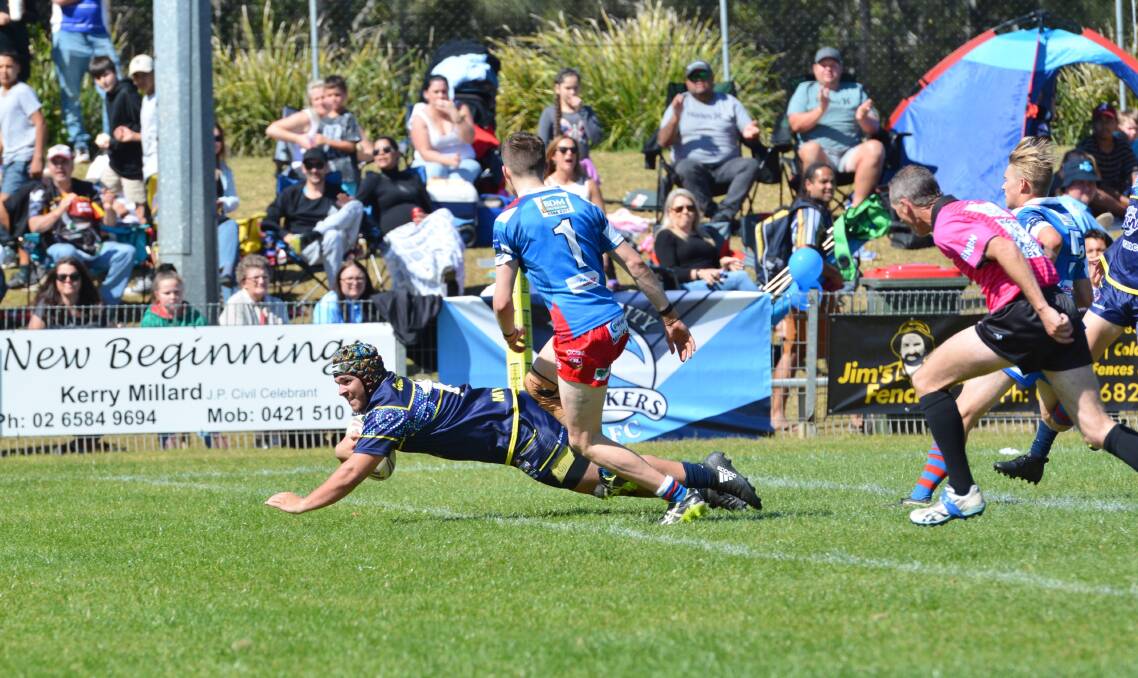 Try-time: Mustangs captain Jesse Douglas crosses for a four-pointer. Photo: Penny Tamblyn. 