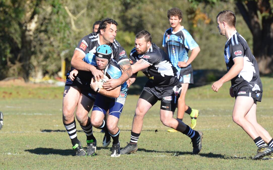 The South West Rocks Marlins and Lower Macleay Magpies battling during the 2018 season.