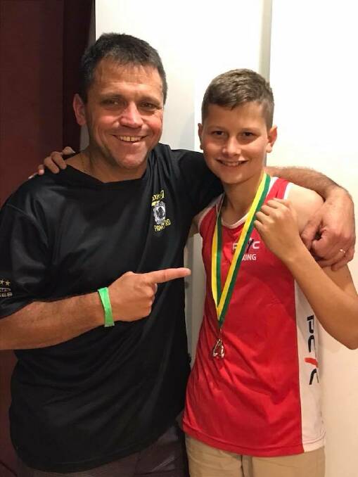 So close: Kye Flanagan (right) with trainer Adam Fathers. Kye claimed silver at the National Golden Gloves last week. Photo: Supplied.