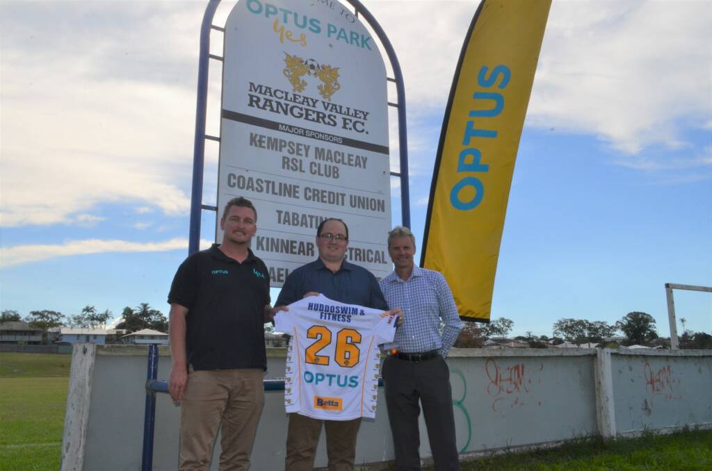 Local support: Optus' Territory General Manager of the Mid North Coast Chris Simon (left) and Regional Director North Cameron Penfold with Rangers president Ashley Williams. Photo: Callum McGregor