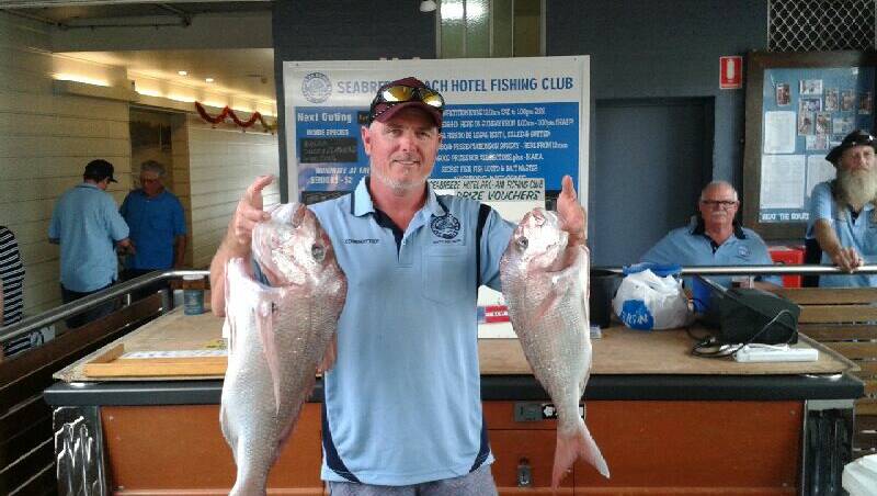 Caught: Grant Rowe shows off his two biggest catches. Photo: Supplied.