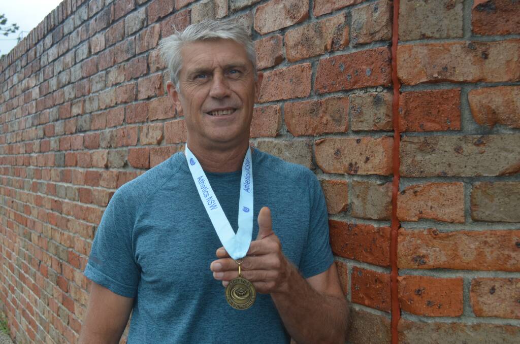 Another achievement: Eddie Van der Jagt claimed gold at the NSW Titles long jump 50-55 event and set a new record. Photo: Callum McGregor.