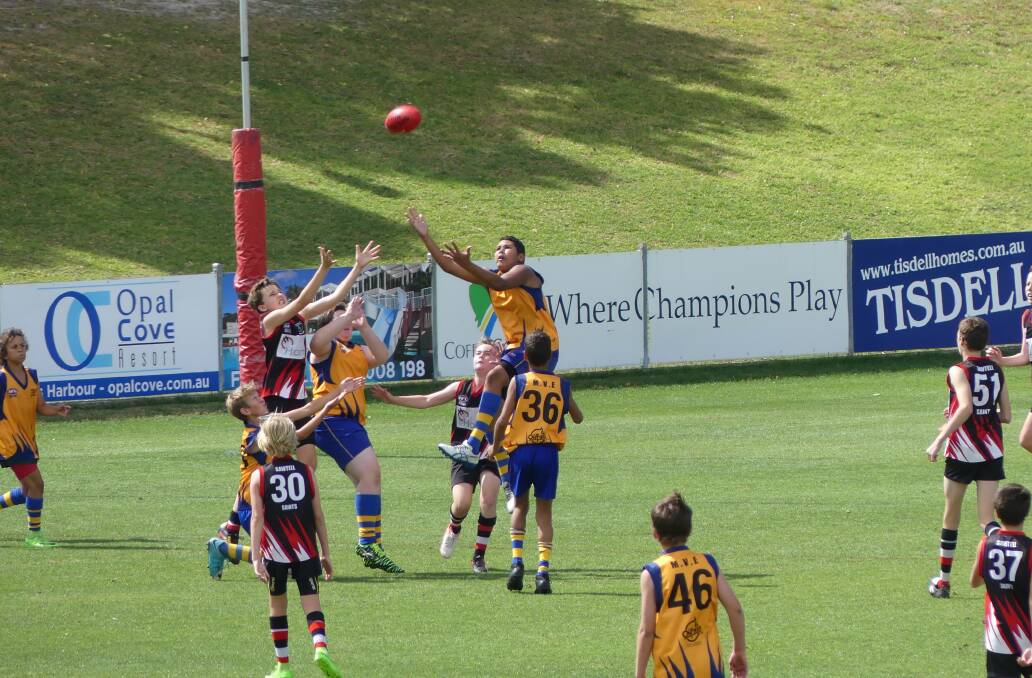 Contest: Lamarh Kelly (leaping highest for the ball) is a Macleay Valley Eagles junior selected into a North Coast Force representative team. Photo: Supplied.