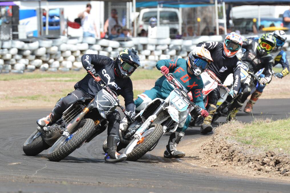 Battle: Jarryd Oram (number 18) tussles for the lead in a heat at the Akubra Classic. Photo: Penny Tamblyn.