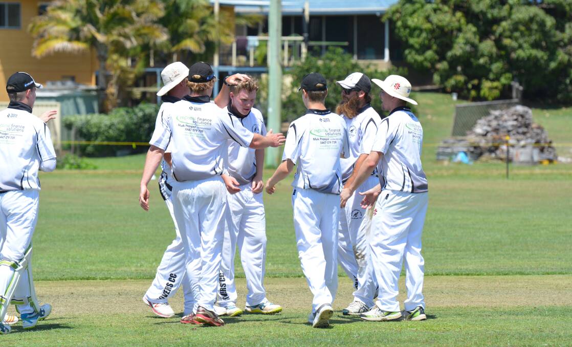 Celebration: Rovers players get around Jackson Korn after the bowler took a wicket earlier this season. Photo: Penny Tamblyn.