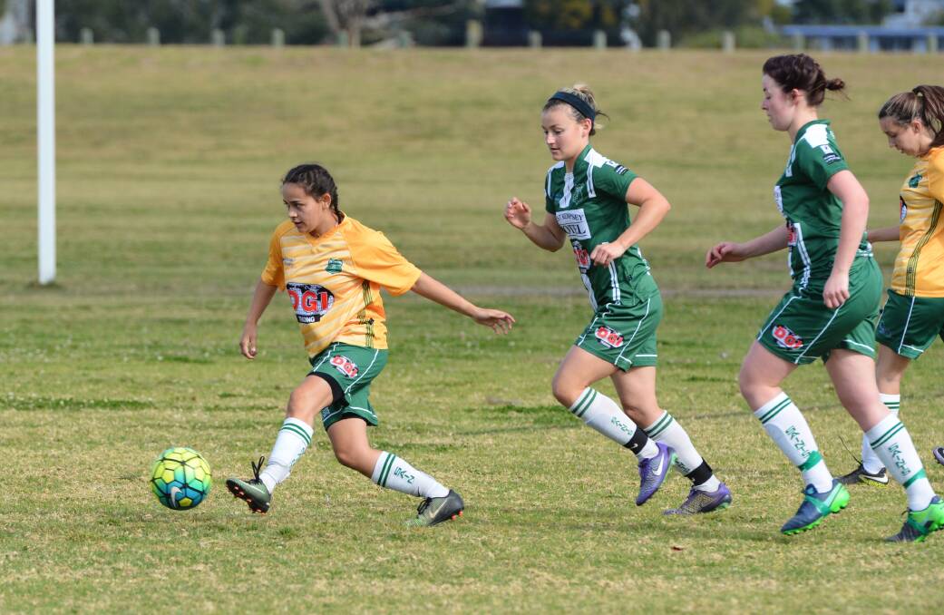Control: Kempsey Saints White side's Antwinette Dunn maintains possession of the ball in their 3-1 victory against Saints Green on Saturday. Photo: Penny Tamblyn.