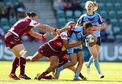 Charge: Nakia carries the ball forward for New South Wales in the State of Origin match against Queensland. Photo: Supplied.