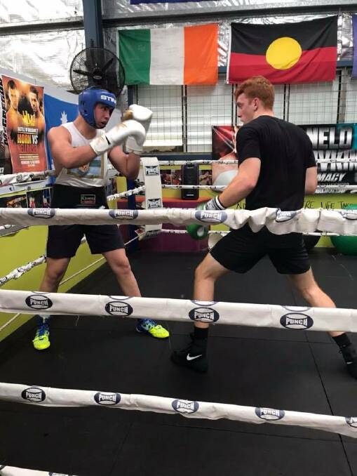 Hands up: Jordan Lennon (Right) spars with Tai Waterman. Photo: Supplied.