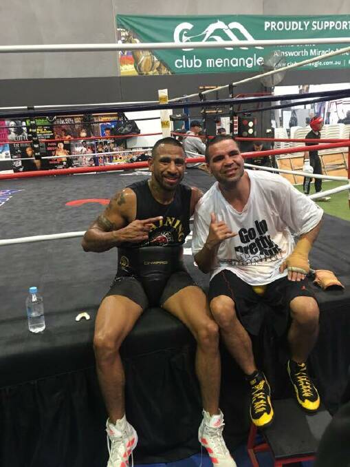 Kempsey boxer Renold Quinlan alongside mentor and former WBA super-middleweight title holder Anthony Mundine. Photo: Supplied