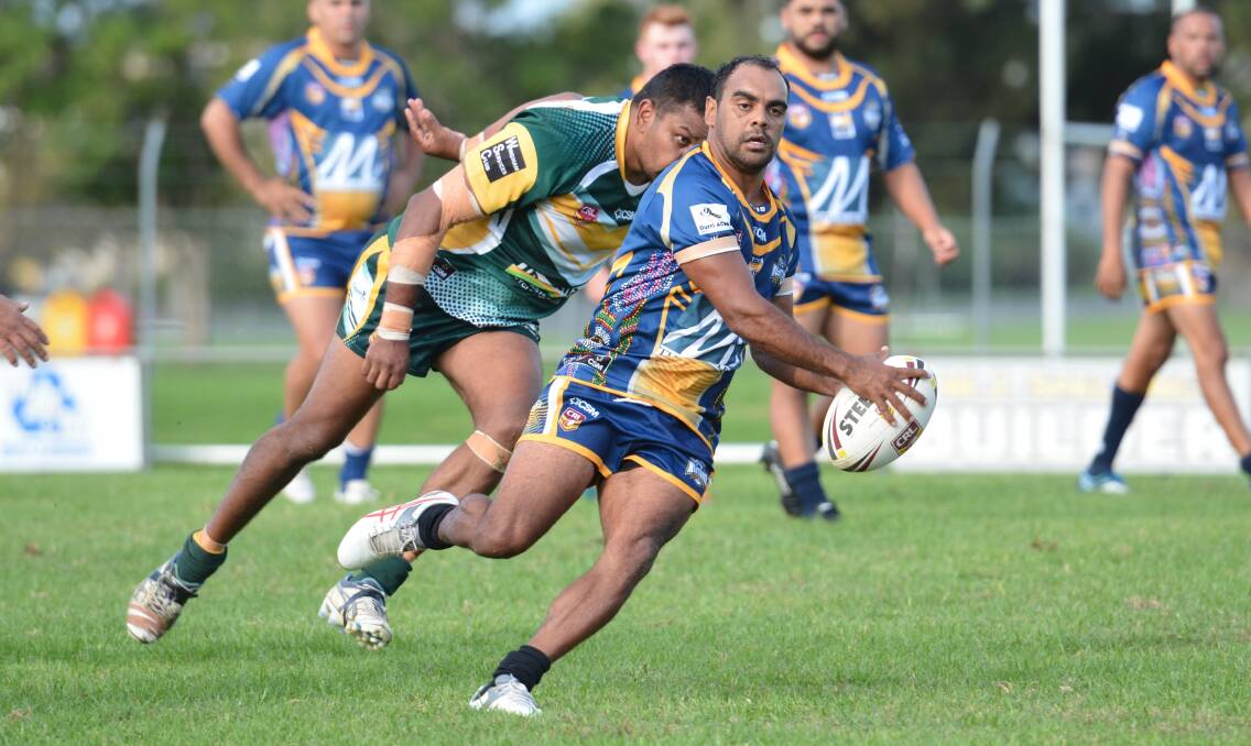 Footwork: Mustangs' Mal Webster after making a break against the Forster-Tuncurry Hawks. Photo: Penny Tamblyn.