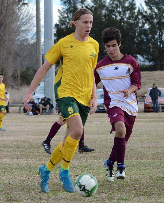 Control: Sam Applegate dribbles the ball for the North Coast CHS Football side. Photo: Supplied.