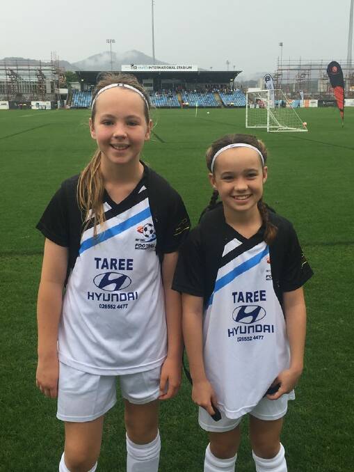 Competitors: Ava Ryan and Chelsea Hackenberg competed for the Football Mid North Coast Under-12s representative side at the State Championships last week. Photo: Supplied.