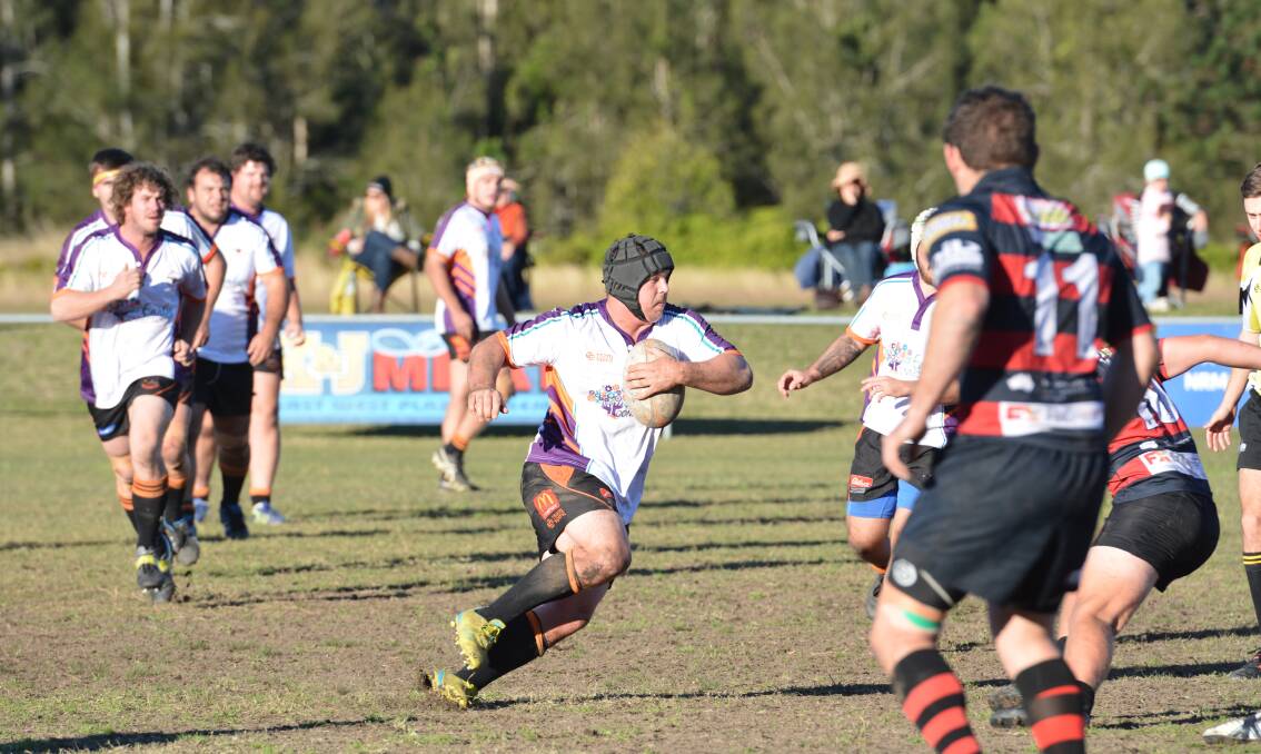 Full steam ahead: Braden Farrawell carries the ball forward for the Kempsey Cannonballs against the Coffs Harbour Snappers last season. Photo: Penny Tamblyn.