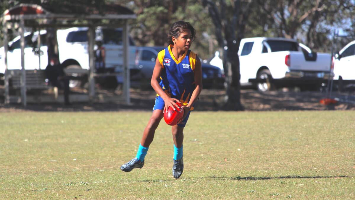 Macleay Valley Eagles junior Yapuma Ward looks for an open teammate. Photo: Supplied