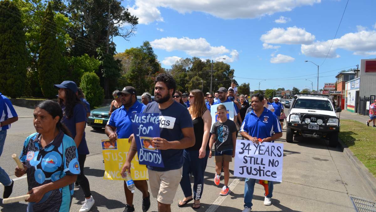 Lewis 'Buddy' Kelly's family and friends march through Kempsey in September last year.