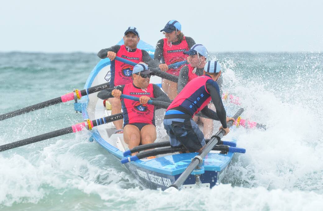 Launch: A Kempsey-Crescent Head Surf Boat crew competing last season. Photo: Penny Tamblyn.
