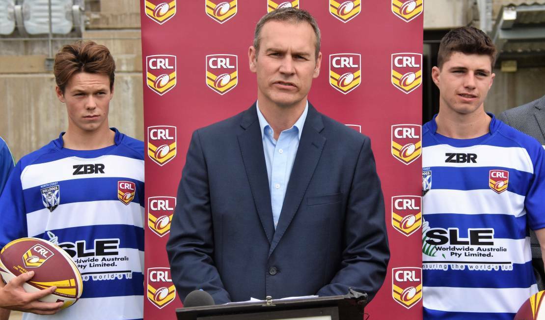 Long-term strategy: Forster's Eli Clark, Bulldogs CEO Andrew Hill and Port Macquarie's Mitch Evans at Wednesday's announcement. Photo: Paul Jobber